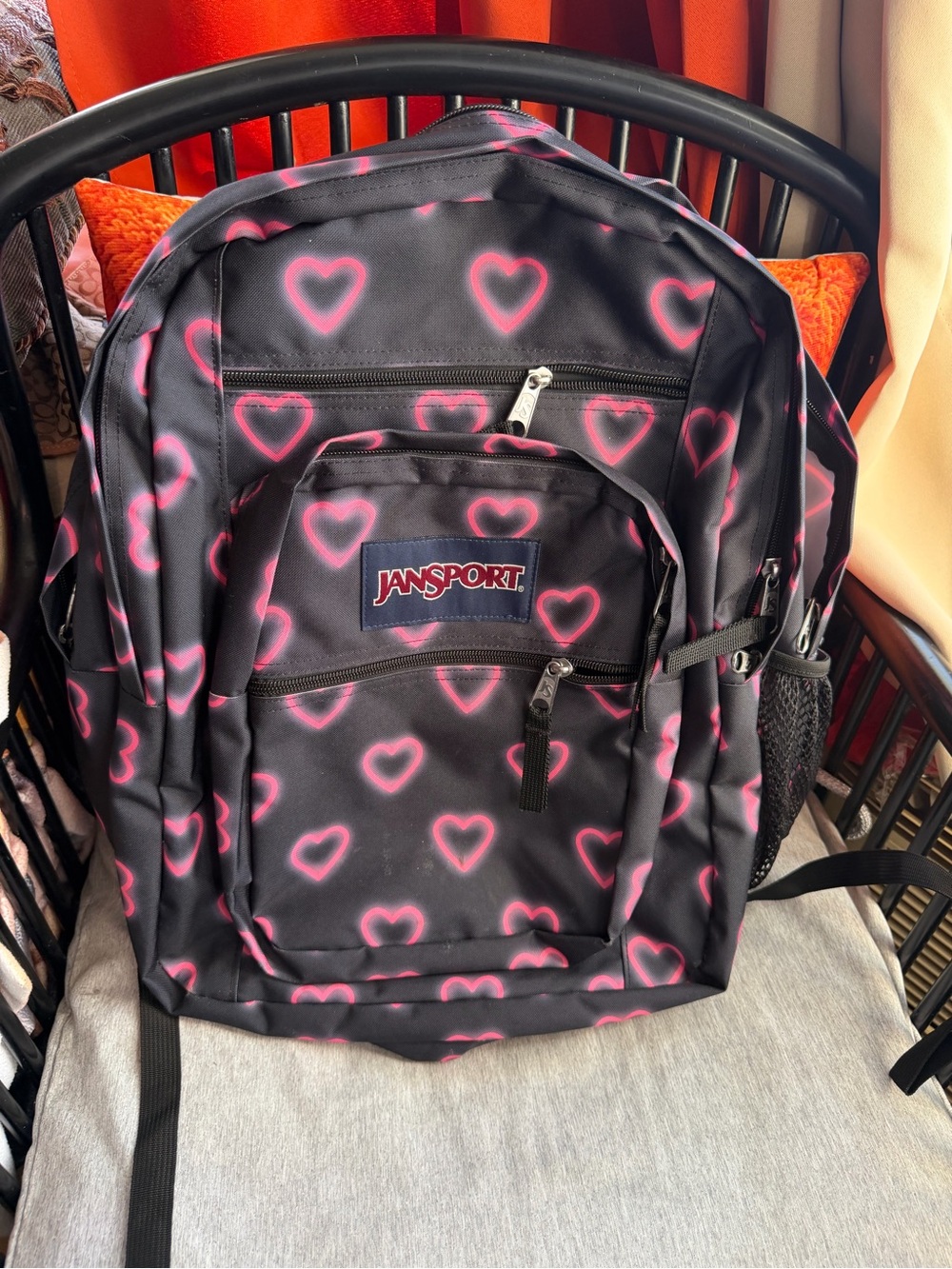 JanSport Black Backpack with Pink Heart Pattern